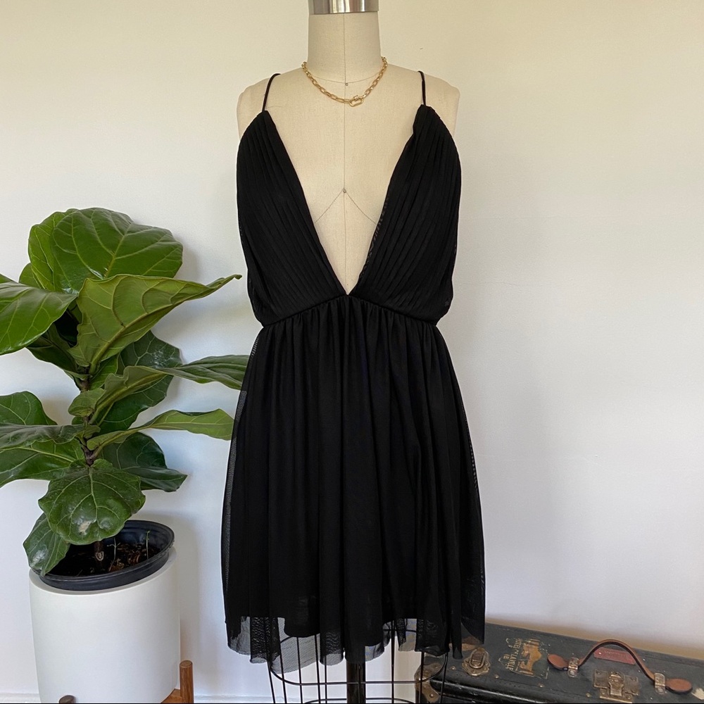 About Us black dress